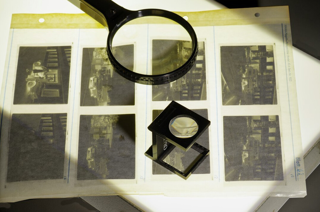 book cover with magnifying glass